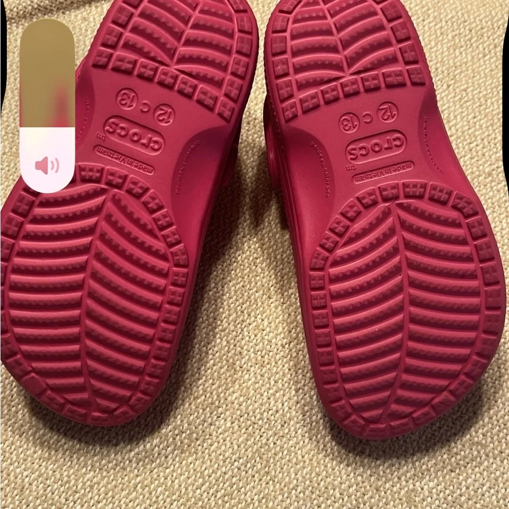 Kids CROCS lined Fuzzy Hot Pink with light pink faux fur. EUC